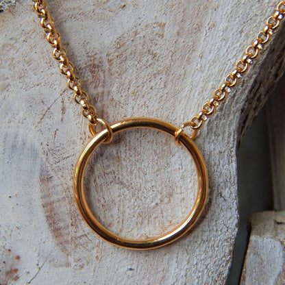 gold chain with an open circle pendant